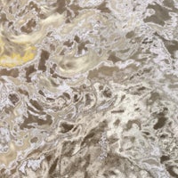 a close up of a yellow and brown liquid