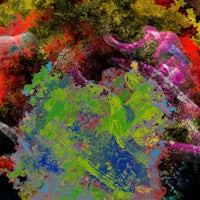 a colorful splatter of paint on a black background